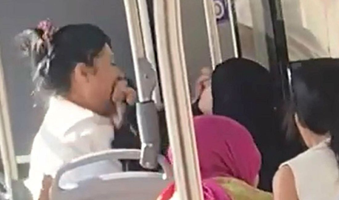 Denizli'de yolcu otobüsü içinde bir bayan ile yolcular ortasında yaşanan