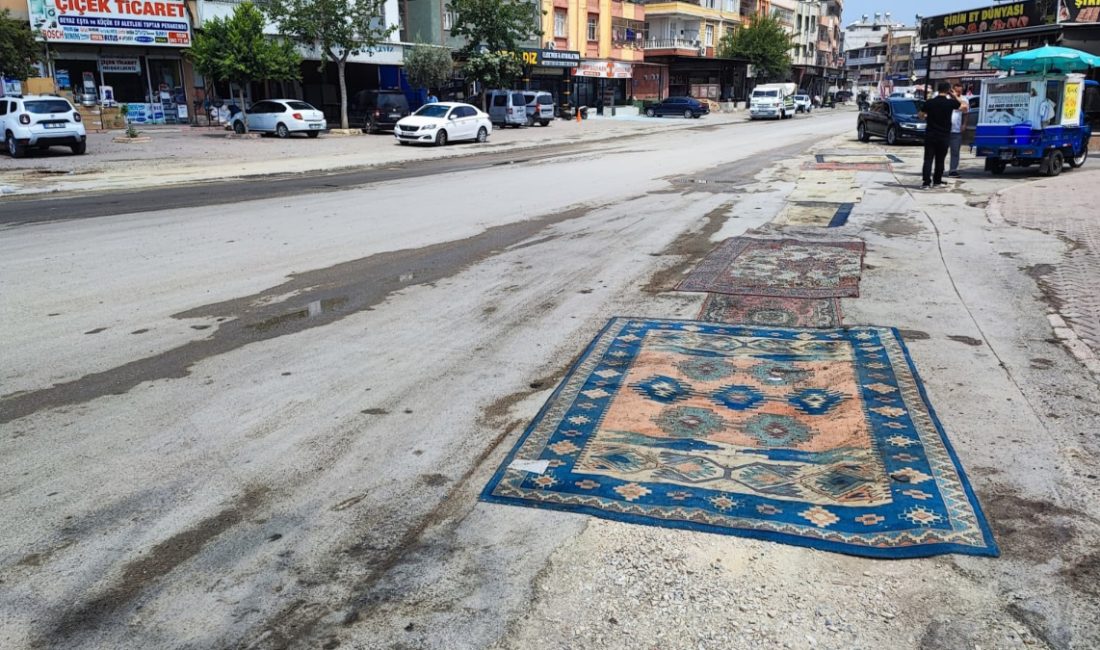 Seyhan ilçesinde kazılan yol, belediye tarafından bir türlü asfaltlanmayınca esnaf