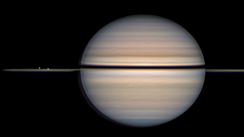 NASA, Satürn’ün buz kaplı uyduları Dione ve Rhea'nın, gezegenin neredeyse
