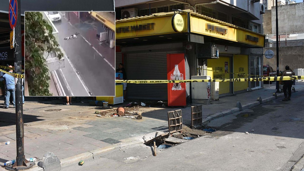 İzmir'in Konak ilçesinde İnanç Öktemay ile Özge Ceren Deniz'in sağanakta,